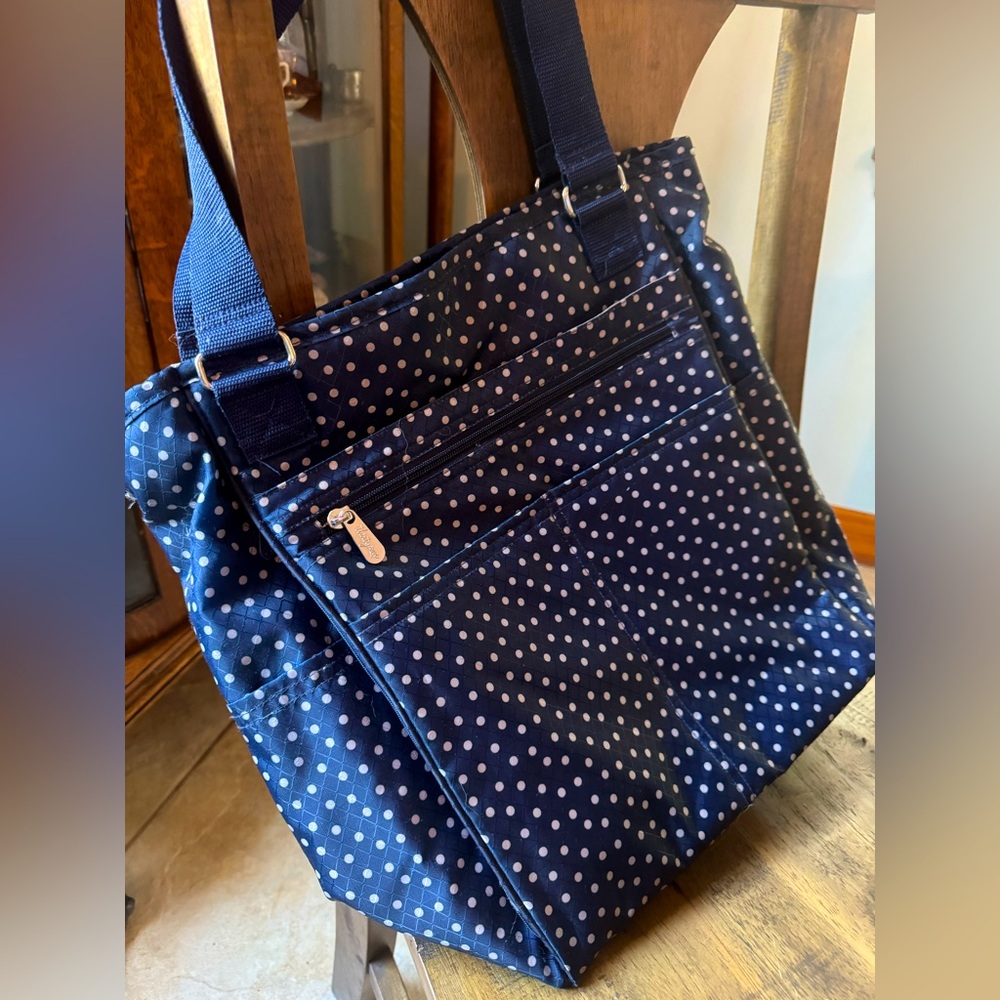 Thirty One brand tote to backpack bag, never used! Lots of storage.